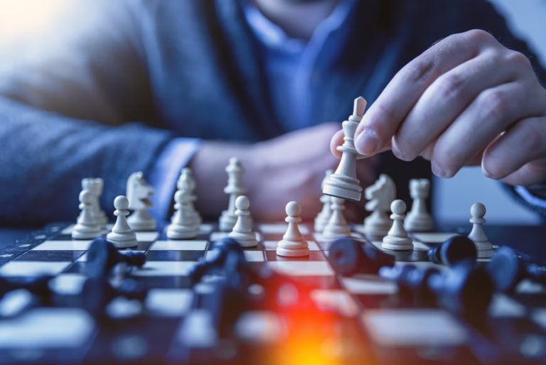 Business Coach Lessons Cover - Man Playing Chess